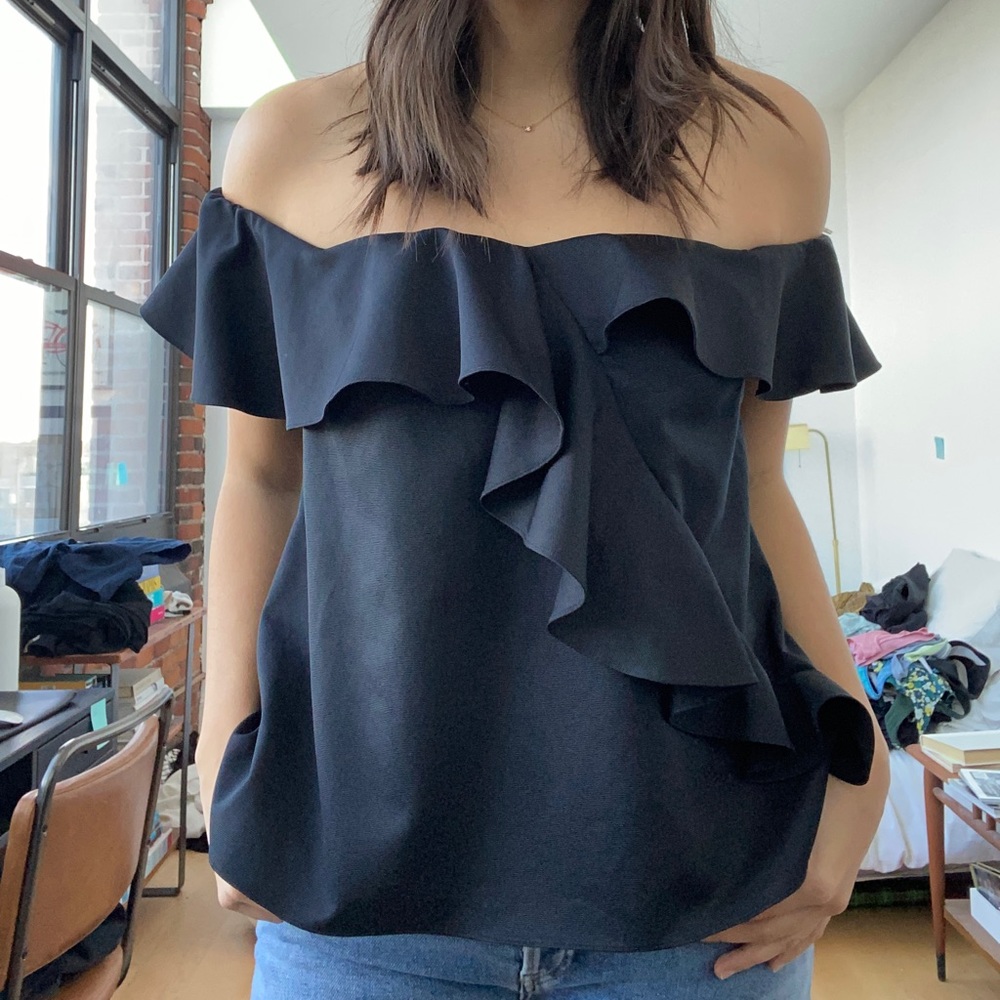 OTS ruffle top